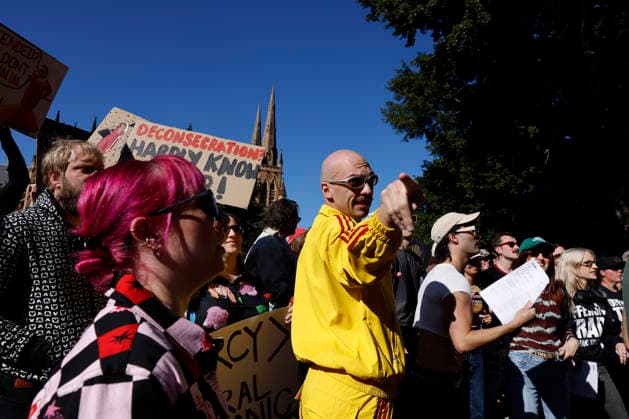 SING-IN PROTEST, People sing and dance during a Sing-In™ protest in solidarity with Divine Playhouse at Hyde Park in Sydney, Saturday, July 25, 2026. The Trans Theatre Group was evicted from its rental property in Kent Street after its landlord Revelop terminated the venue s lease claiming offensive trade - a legal term deriving from an 1842 NSW law implemented to regulate foul smells and industrial waste - and never once in 184 years has a court been asked to consider if it extends to moral offensiveness. ( NO ARCHIVING SYDNEY NEW SOUTH WALES AUSTRALIA  Copyright: xJESSICAxHROMASx 20260725117424316574