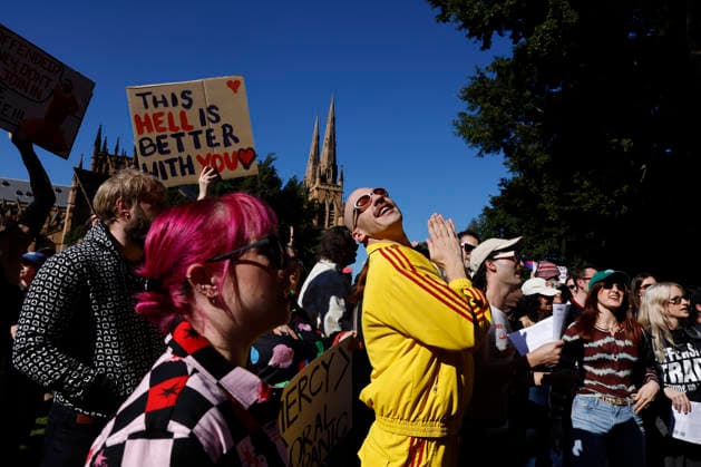 SING-IN PROTEST, People sing and dance during a Sing-In™ protest in solidarity with Divine Playhouse at Hyde Park in Sydney, Saturday, July 25, 2026. The Trans Theatre Group was evicted from its rental property in Kent Street after its landlord Revelop terminated the venue s lease claiming offensive trade - a legal term deriving from an 1842 NSW law implemented to regulate foul smells and industrial waste - and never once in 184 years has a court been asked to consider if it extends to moral offensiveness. ( NO ARCHIVING SYDNEY NEW SOUTH WALES AUSTRALIA  Copyright: xJESSICAxHROMASx 20260725137022382749