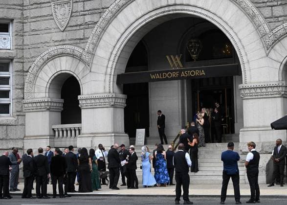 (260725) -- WASHINGTON, July 25, 2026 -- People enter the Waldorf Astoria hotel to attend the White House Correspondents Association Dinner in Washington, D.C., the United States, July 24, 2026. The rescheduled 2026 White House Correspondents Association Dinner was held at the Waldorf Astoria hotel here on Friday. The dinner was rescheduled after gunshots were heard during the original event at the Washington Hilton Hotel on April 25, leading to the emergency evacuation of U.S. President Donald Trump and the arrest of the suspect. ) U.S.-WASHINGTON, D.C.-WHITE HOUSE CORRESPONDENTS ASSOCIATION DINNER LixRui 