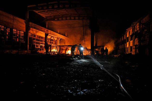Rescuers extinguish a fire at a shopping complex caused by a Russian attack in Zaporizhzhia, Ukraine, July 25, 2026. In the early hours of Saturday, July 25, Russian troops struck the southeastern Ukrainian city with drones, igniting a fire that spread through shops and trading pavilions over an area of about 900 square metres. A 63-year-old man was injured in the drone strike. (Photo by Dmytro Smolienko Ukrinform) Russian army attacks Zaporizhzhia with drones  Copyright: xDmytroxSmolienkox