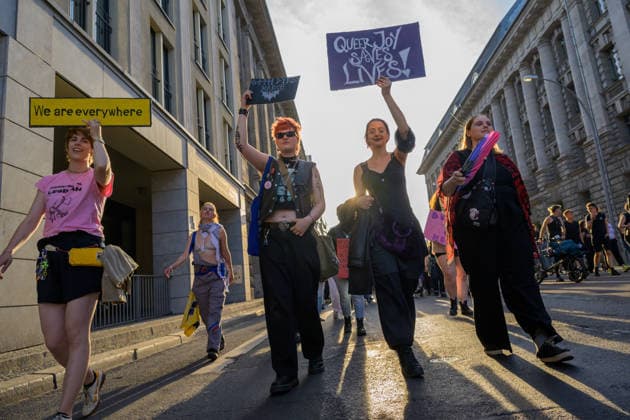 July 24, 2026, Berlin, Berlin, Germany: People show their placards in favor of Queer people, at Dyke* March 2026, on July 24 2026, in Berlin, Germany. Thousands of demonstrators marched in the streets of Berlin s City Center and Kreuzberg districts for the annual Dyke* March just a day before the annual CSD parade and Internationalist Queer Pride Berlin Germany  - ZUMAk201 20260724_zip_k201_008 Copyright: xNikosxKanistrasx