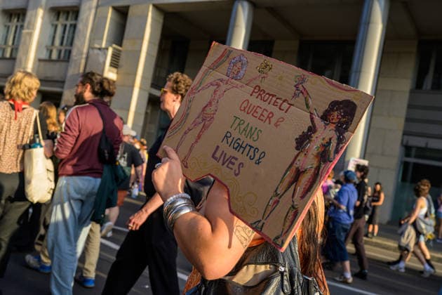 July 24, 2026, Berlin, Berlin, Germany: A person marches along with their placard in favor of Queer person s rights at Dyke* March 2026, on July 24 2026, in Berlin, Germany. Thousands of demonstrators marched in the streets of Berlin s City Center and Kreuzberg districts for the annual Dyke* March just a day before the annual CSD parade and Internationalist Queer Pride Berlin Germany - ZUMAk201 20260724_zip_k201_006 Copyright: xNikosxKanistrasx