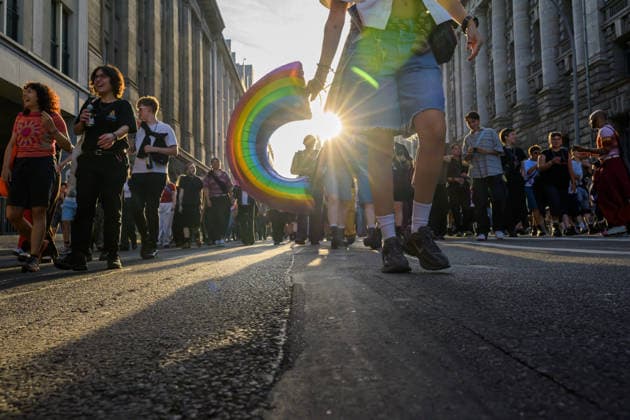 July 24, 2026, Berlin, Berlin, Germany: A person holds a rainbow ballon at Dyke* March 2026, on July 24 2026, in Berlin, Germany. Thousands of demonstrators marched in the streets of Berlin s City Center and Kreuzberg districts for the annual Dyke* March just a day before the annual CSD parade and Internationalist Queer Pride Berlin Germany - ZUMAk201 20260724_zip_k201_009 Copyright: xNikosxKanistrasx