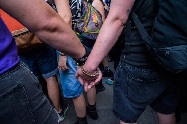 July 24, 2026, Berlin, Berlin, Germany: Two demonstrators of same sex hold hands at Dyke* March 2026, on July 24 2026, in Berlin, Germany. Thousands of demonstrators marched in the streets of Berlin s City Center and Kreuzberg districts for the annual Dyke* March just a day before the annual CSD parade and Internationalist Queer Pride Berlin Germany  - ZUMAk201 20260724_zip_k201_017 Copyright: xNikosxKanistrasx
