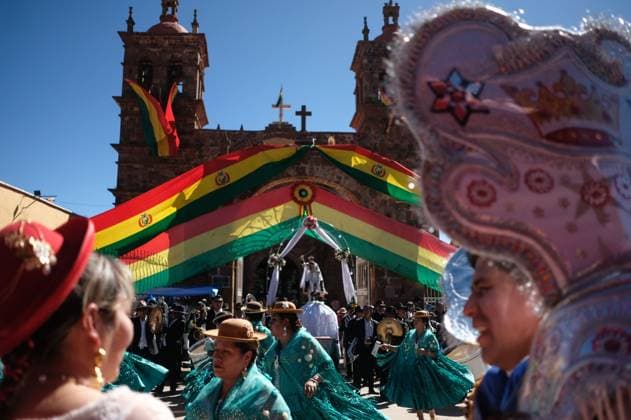 July 24, 2026, Guaqui, La Paz, Bolivia: GUAQUI, BOLIVIA Ã¢â‚¬ JULY 24, 2026: Devotees take part in the traditional Balseada Festival honoring Saint James the Apostle (Santiago ApoÂ³stol) on Lake Titicaca in Guaqui, Bolivia. The annual celebration features a ceremonial procession of decorated boats attended by residents, pilgrims and local authorities. Guaqui, La Paz Bolivia  - ZUMAq101 20260724_zna_q101_242 Copyright: xCarlosxSoÂ¡NchezxNavasx