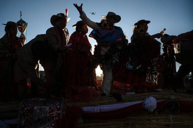 July 24, 2026, Guaqui, La Paz, Bolivia: GUAQUI, BOLIVIA Ã¢â‚¬ JULY 24, 2026: Devotees take part in the traditional Balseada Festival honoring Saint James the Apostle (Santiago ApoÂ³stol) on Lake Titicaca in Guaqui, Bolivia. The annual celebration features a ceremonial procession of decorated boats attended by residents, pilgrims and local authorities. Guaqui, La Paz Bolivia  - ZUMAq101 20260724_zna_q101_245 Copyright: xCarlosxSoÂ¡NchezxNavasx