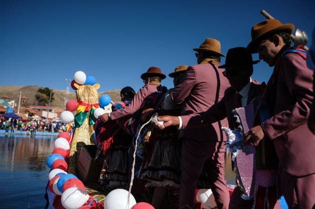 July 24, 2026, Guaqui, La Paz, Bolivia: GUAQUI, BOLIVIA Ã¢â‚¬ JULY 24, 2026: Devotees take part in the traditional Balseada Festival honoring Saint James the Apostle (Santiago ApoÂ³stol) on Lake Titicaca in Guaqui, Bolivia. The annual celebration features a ceremonial procession of decorated boats attended by residents, pilgrims and local authorities. Guaqui, La Paz Bolivia - ZUMAq101 20260724_zna_q101_236 Copyright: xCarlosxSoÂ¡NchezxNavasx