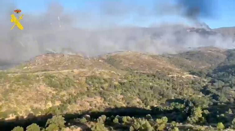 Hundreds of firefighters battle wildfires near Spanish capital MADRID, SPAIN - JULY 25: (----EDITORIAL USE ONLY - MANDATORY CREDIT - SPAIN S GUARDIA CIVIL HANDOUT - NO MARKETING NO ADVERTISING CAMPAIGNS - DISTRIBUTED AS A SERVICE TO CLIENTS----) A screen grab taken from a video shows the wildfire that swept through Spain as emergency crews continued efforts near the Madrid, Spain on July 25, 2026. Spain s Civil Protection agency reported that more than 650 personnel were deployed to the field to establish containment lines as dry, hot conditions persisted across the region. Spain s Guardia Civil Anadolu Madrid Spain. Editorial use only. Please get in touch for any other usage.  Copyright: x2026xAnadoluxSpain sxGuardiaxCivilx