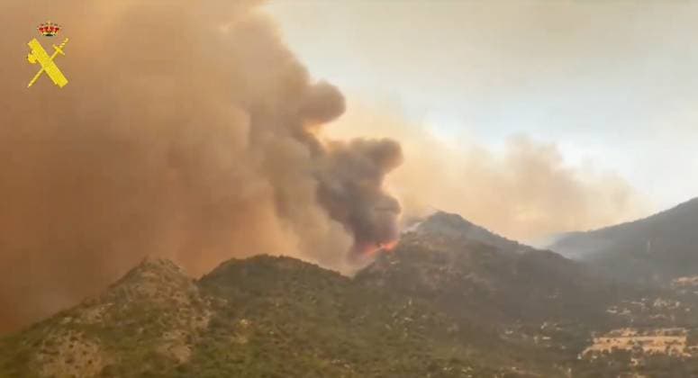 Hundreds of firefighters battle wildfires near Spanish capital MADRID, SPAIN - JULY 25: (----EDITORIAL USE ONLY - MANDATORY CREDIT - SPAIN S GUARDIA CIVIL HANDOUT - NO MARKETING NO ADVERTISING CAMPAIGNS - DISTRIBUTED AS A SERVICE TO CLIENTS----) A screen grab taken from a video shows the wildfire that swept through Spain as emergency crews continued efforts near the Madrid, Spain on July 25, 2026. Spain s Civil Protection agency reported that more than 650 personnel were deployed to the field to establish containment lines as dry, hot conditions persisted across the region. Spain s Guardia Civil Anadolu Madrid Spain. Editorial use only. Please get in touch for any other usage.  Copyright: x2026xAnadoluxSpain sxGuardiaxCivilx