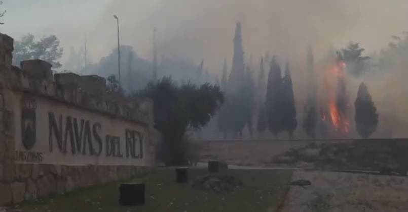 Spain wildfires scorch nearly 62,000 acres, affecting over 60,000 people NAVAS DEL REY, MADRID, SPAIN – JULY 25: (----EDITORIAL USE ONLY - MANDATORY CREDIT - MILITARY EMERGENCY UNIT OF SPAIN HANDOUT - NO MARKETING NO ADVERTISING CAMPAIGNS - DISTRIBUTED AS A SERVICE TO CLIENTS----) A screen grab taken from a video shows flames burn near the entrance to Navas del Rey as the Sierra Oeste wildfire spreads through the Madrid region of central Spain on July 25, 2026. Firefighters and emergency crews continued efforts to contain the blaze after multiple wildfires merged into a single large fire amid hot, dry and windy conditions. Military Emergency Unit of Spain Handout Anadolu Madrid Spain. Editorial use only. Please get in touch for any  Copyright: x2026xAnadoluxMilitaryxEmergencyxUnitxofxSpain Handoutx