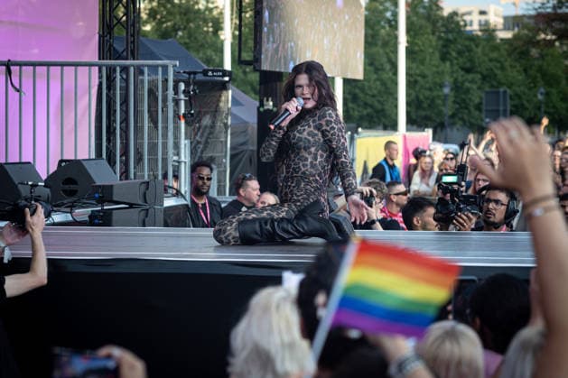 July 24, 2026, Berlin, Germany: Berlin-based rapper Ikkimel performs on stage in front of an LGBT flag during the Democracy Evening? rally at the Brandenburg Gate on the opening day of Christopher Street Day (CSD). Christopher Street Day (CSD) is Berlin™s annual Pride demonstration for the rights and visibility of lesbian, gay, bisexual, transgender, intersex and other queer people. Its name refers to Christopher Street in New York City, where resistance to a police raid at the Stonewall Inn in June 1969 sparked several days of protests and became a landmark in the modern LGBTQ+ rights movement..Berlin held its first Christopher Street Day in West Berlin on June 30, 1979. Around 450 people joined the demonstration under the slogan - ZUMAs197 20260724_aaa_s197_348 Copyright: xVasilyxKrestyaninovx