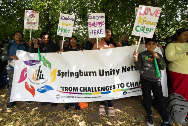 July 25, 2026, Glasgow, Scotland, UK: Pro-immigration protesters aligned with Stand Up To Racism Scotland and other allied organisations hold placards and banners during a demonstration in Glasgow. The protest took place amid heightened tensions over immigration and asylum seekers following months of unrest and protests across Scotland and was met with a counter protest held by anti-immigration supporters. Glasgow UK - ZUMAs357 20260725_zip_s357_010 Copyright: xCameronxScottx