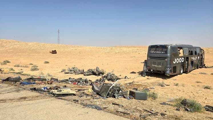 (260725) -- HOMS, July 25, 2026 -- This photo taken on July 25, 2026 shows the site of a collision involving two passenger buses on the Damascus-Deir al-Zour highway in Homs province, Syria. The death toll from a collision involving two passenger buses on the Damascus-Deir al-Zour highway in central Syria on Saturday has risen to 35, Syrian state news agency SANA reported, citing a health official. ( Xinhua) (SpotNews) SYRIA-HOMS-BUS COLLISION Str 