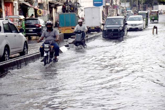 July 25, 2026, Pakistan: Lahore Commuters Struggle with Transport Disruptions Due to Poor Sewerage System Amid Monsoon Rains at Garhi Shahu Area Pakistan  - ZUMAas3_ 20260725_zaf_as3_022 Copyright: xPPIx