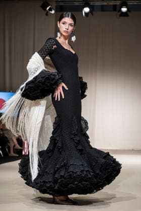 July 25, 2026, Madrid, Spain: A model walks the runway wearing a design by Flamentex during the Momad Fashion Week de Madrid in IFEMA. Madrid Spain  - ZUMAs197 20260725_aaa_s197_069 Copyright: xAtilanoxGarciax