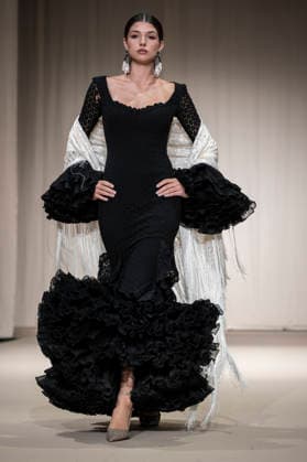 July 25, 2026, Madrid, Spain: A model walks the runway wearing a design by Flamentex during the Momad Fashion Week de Madrid in IFEMA. Madrid Spain  - ZUMAs197 20260725_aaa_s197_076 Copyright: xAtilanoxGarciax