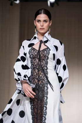 July 25, 2026, Madrid, Spain: A model walks the runway wearing a design by Flamentex during the Momad Fashion Week de Madrid in IFEMA. Madrid Spain  - ZUMAs197 20260725_aaa_s197_081 Copyright: xAtilanoxGarciax