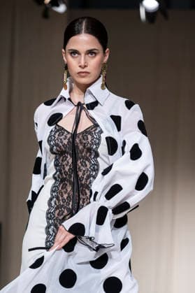 July 25, 2026, Madrid, Spain: A model walks the runway wearing a design by Flamentex during the Momad Fashion Week de Madrid in IFEMA. Madrid Spain  - ZUMAs197 20260725_aaa_s197_084 Copyright: xAtilanoxGarciax