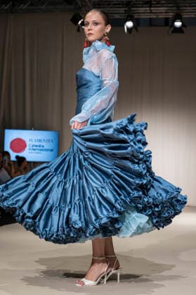 July 25, 2026, Madrid, Spain: A model walks the runway wearing a design by Flamentex during the Momad Fashion Week de Madrid in IFEMA. Madrid Spain  - ZUMAs197 20260725_aaa_s197_100 Copyright: xAtilanoxGarciax
