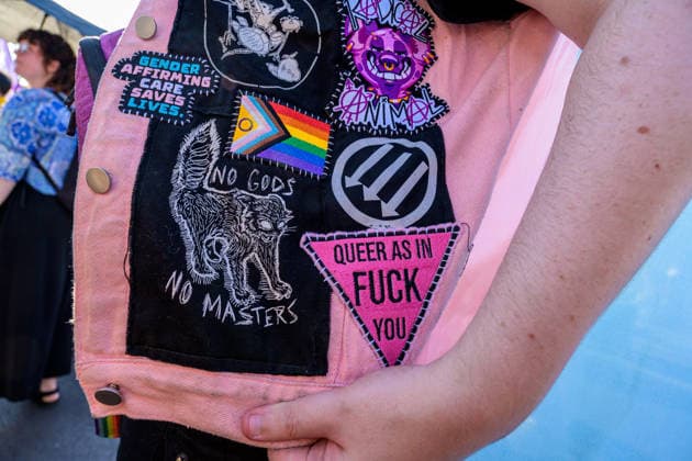 July 25, 2026, Berlin, Berlin, Germany: A demonstrator shows off their patch collection at the Internationalist Queer Pride on July 25 2026 in Berlin Germany. Thousands of people marched in Wedding district of Berlin to protest against queerophobia and for equallity, as well as against imperialism and the genocidal war of Israel in Gaza and the rest of the Palestinian Territories, in the annual Internationalist Queer Pride of 2026 in Berlin. Berlin Germany  - ZUMAk201 20260725_zip_k201_027 Copyright: xNikosxKanistrasx