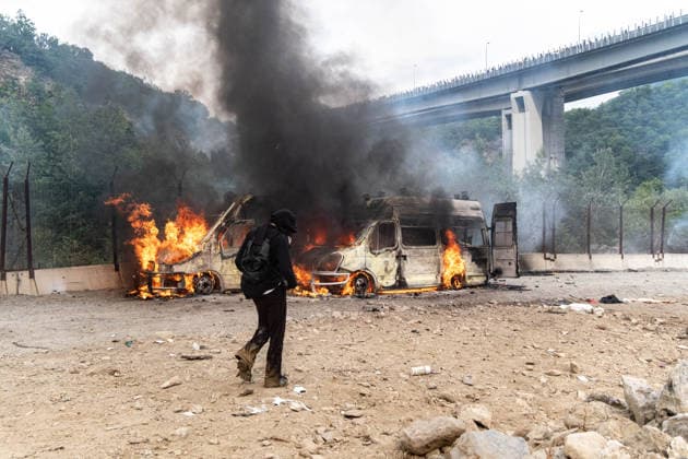 July 25, 2026, Susa, Piedmont, Italy: On July 25, 2026, thousands of people departed from AltaFelicito , a music festival in Venaus, to reach the construction sites of the TAV (High speed rail), a railway project to connect Italy and France. The demonstrators managed to enter the site and there clashed with the police, who responded with tear gas. Many of the buildings inside were put on fire, including two police vehicles. The TAV project has been highly contested during the last 30 years because of environmental damages and increasing costs. Susa Italy  - ZUMAs377 20260725_znp_s377_001 Copyright: xPietroxStariccox
