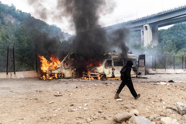 July 25, 2026, Susa, Piedmont, Italy: On July 25, 2026, thousands of people departed from AltaFelicito , a music festival in Venaus, to reach the construction sites of the TAV (High speed rail), a railway project to connect Italy and France. The demonstrators managed to enter the site and there clashed with the police, who responded with tear gas. Many of the buildings inside were put on fire, including two police vehicles. The TAV project has been highly contested during the last 30 years because of environmental damages and increasing costs. Susa Italy  - ZUMAs377 20260725_znp_s377_002 Copyright: xPietroxStariccox