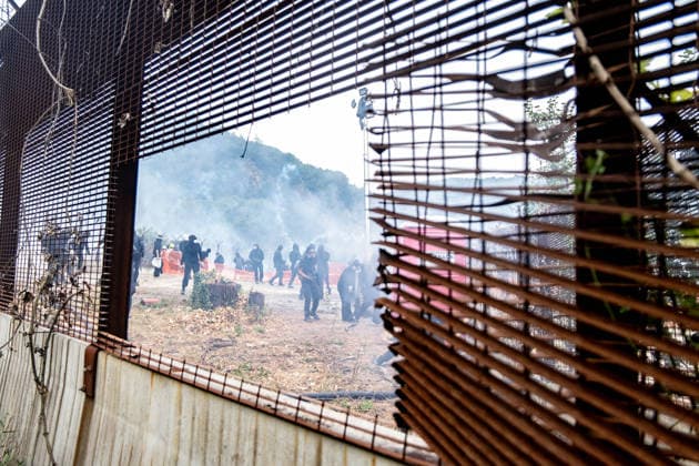 July 25, 2026, Susa, Piedmont, Italy: On July 25, 2026, thousands of people departed from AltaFelicito , a music festival in Venaus, to reach the construction sites of the TAV (High speed rail), a railway project to connect Italy and France. The demonstrators managed to enter the site and there clashed with the police, who responded with tear gas. Many of the buildings inside were put on fire, including two police vehicles. The TAV project has been highly contested during the last 30 years because of environmental damages and increasing costs. Susa Italy  - ZUMAs377 20260725_znp_s377_031 Copyright: xPietroxStariccox