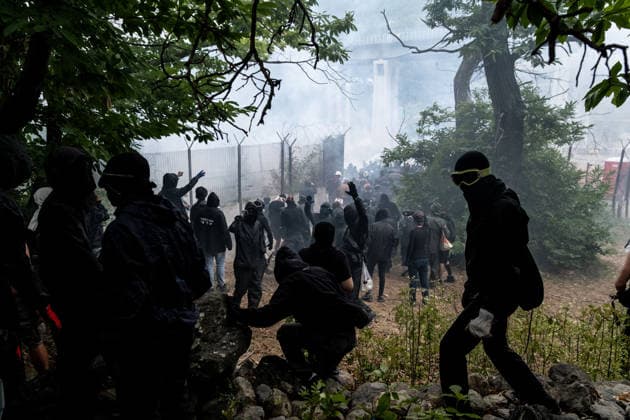 July 25, 2026, Susa, Piedmont, Italy: On July 25, 2026, thousands of people departed from AltaFelicito , a music festival in Venaus, to reach the construction sites of the TAV (High speed rail), a railway project to connect Italy and France. The demonstrators managed to enter the site and there clashed with the police, who responded with tear gas. Many of the buildings inside were put on fire, including two police vehicles. The TAV project has been highly contested during the last 30 years because of environmental damages and increasing costs. Susa Italy  - ZUMAs377 20260725_znp_s377_032 Copyright: xPietroxStariccox