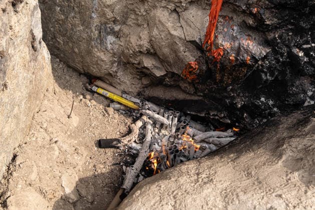 July 25, 2026, Susa, Piedmont, Italy: On July 25, 2026, thousands of people departed from AltaFelicito , a music festival in Venaus, to reach the construction sites of the TAV (High speed rail), a railway project to connect Italy and France. The demonstrators managed to enter the site and there clashed with the police, who responded with tear gas. Many of the buildings inside were put on fire, including two police vehicles. The TAV project has been highly contested during the last 30 years because of environmental damages and increasing costs. Susa Italy  - ZUMAs377 20260725_znp_s377_038 Copyright: xPietroxStariccox