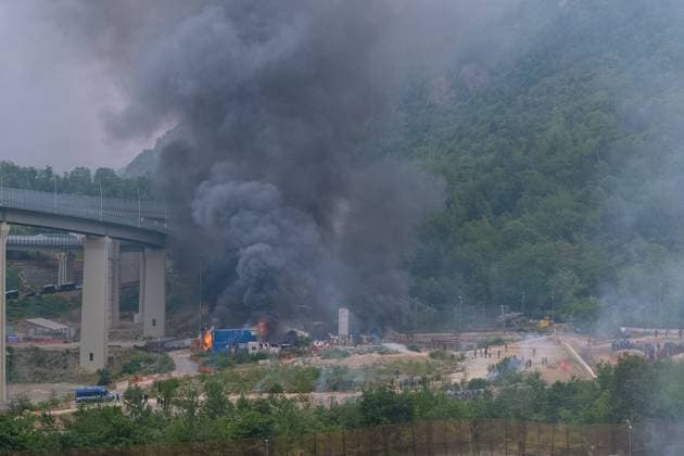 July 25, 2026, Chiomonte, Val Di Susa, Italy: CHIOMONTE, VAL DI SUSA, PIEDMONT, ITALY Ã¢â‚¬ JULY 25, 2026: Masked activists from the No TAV movement, which opposes the Turin-Lyon high-speed railway project, clash with security forces after storming the high-speed rail construction site in Chiomonte. Protesters threw rocks and firecrackers, setting fire to four vehicles belonging to the Carabinieri and Guardia di Finanza. Police responded with tear gas and water cannons, leaving more than 50 security personnel injured and forcing the closure of a section of the A32 Turin-Bardonecchia motorway. Chiomonte, Val Di Susa Italy  - ZUMAq101 20260725_zna_q101_275 Copyright: xLeonardoxGaravagliax