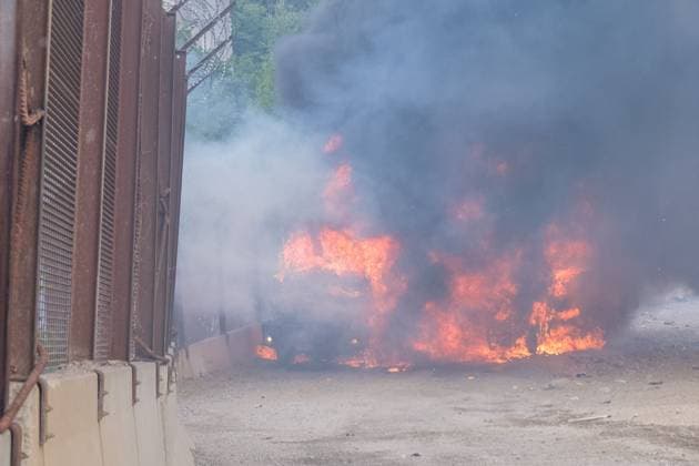 July 25, 2026, Chiomonte, Val Di Susa, Italy: CHIOMONTE, VAL DI SUSA, PIEDMONT, ITALY Ã¢â‚¬ JULY 25, 2026: Masked activists from the No TAV movement, which opposes the Turin-Lyon high-speed railway project, clash with security forces after storming the high-speed rail construction site in Chiomonte. Protesters threw rocks and firecrackers, setting fire to four vehicles belonging to the Carabinieri and Guardia di Finanza. Police responded with tear gas and water cannons, leaving more than 50 security personnel injured and forcing the closure of a section of the A32 Turin-Bardonecchia motorway. Chiomonte, Val Di Susa Italy  - ZUMAq101 20260725_zna_q101_278 Copyright: xLeonardoxGaravagliax
