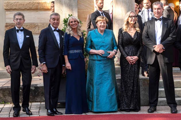 Joachim Sauer, Michel Friedman, Karin Soeder, Angela Merkel, Katharina Wagner, Markus Soeder attend the concert of Beethovens 9. Symphonie to open the annual Bayreuth Festival 2026 (Richard-Wagner-Festspiele) at Bayreuth Festspielhaus on July 25, 2026 in Bayreuth, Germany 150th Bayreuther Wagner Festival Opening *** Joachim Sauer, Michel Friedman, Karin Soeder, Angela Merkel, Katharina Wagner, Markus Soeder attended the concert featuring Beethoven’s Ninth Symphony to open the annual 2026 Bayreuth Festival (Richard Wagner Festival) at the Bayreuth Festspielhaus on July 25, 2026, in Bayreuth, Germany—the 150th Bayreuth Wagner Festival Opening