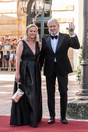 Tanja Surmann and Johnny Logan attend the concert of Beethovens 9. Symphonie to open the annual Bayreuth Festival 2026 (Richard-Wagner-Festspiele) at Bayreuth Festspielhaus on July 25, 2026 in Bayreuth, Germany 150th Bayreuther Wagner Festival Opening *** Tanja Surmann and Johnny Logan attend the concert featuring Beethoven s Ninth Symphony to open the annual 2026 Bayreuth Festival (Richard Wagner Festival) at the Bayreuth Festspielhaus on July 25, 2026, in Bayreuth, Germany—the 150th Bayreuth Wagner Festival Opening