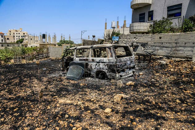 July 25, 2026, Nablus, West Bank, Palestine: Charred remains of a vehicle are seen after it was set on fire by Jewish settlers in the village of Tell, southwest of Nablus in the West Bank. This attack came in retaliation for the killing of two settlers and four Palestinians in Tell, southwest of Nablus in the West Bank. In response, settlers set fire to Palestinian cars and homes in Tell and the neighboring village of Qalqilya Sara. Meanwhile, the Israeli army announced its readiness for a military operation in the northern West Bank, which is under the control of the Palestinian Authority. Nablus Palestine - ZUMAs197 20260725_aaa_s197_248 Copyright: xNasserxishatyehx
