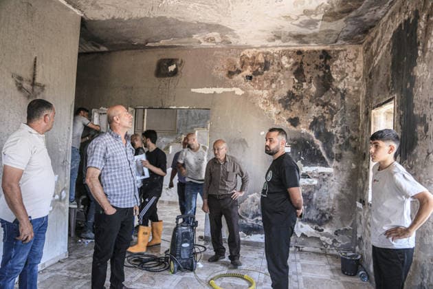 July 25, 2026, Nablus, West Bank, Palestine: Palestinians inspect a burned-out house set on fire by Jewish settlers in the village of Tell, southwest of Nablus in the West Bank. This attack came in retaliation for the killing of two settlers and four Palestinians in Tell, southwest of Nablus in the West Bank. In response, settlers set fire to Palestinian cars and homes in Tell and the neighboring village of Qalqilya Sara. Meanwhile, the Israeli army announced its readiness for a military operation in the northern West Bank, which is under the control of the Palestinian Authority. Nablus Palestine - ZUMAs197 20260725_aaa_s197_261 Copyright: xNasserxishatyehx