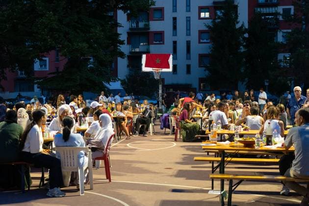 July 25, 2026, Bologna, IT: BOLOGNA, ITALY - JULY 25, 2026: Large crowds gather for a dinner and vigil in memory of Abderrahim Fakir at Pilastro Park, Bologna. The neighborhood event was organized by local grassroots committees together with Fakir s family, following days of citywide mobilization to commemorate the 42-year-old Moroccan man who died on July 19 during a police stop. JNA Press Bologna IT - ZUMAq101 20260725_zna_q101_343 Copyright: xThomasxCavagnax