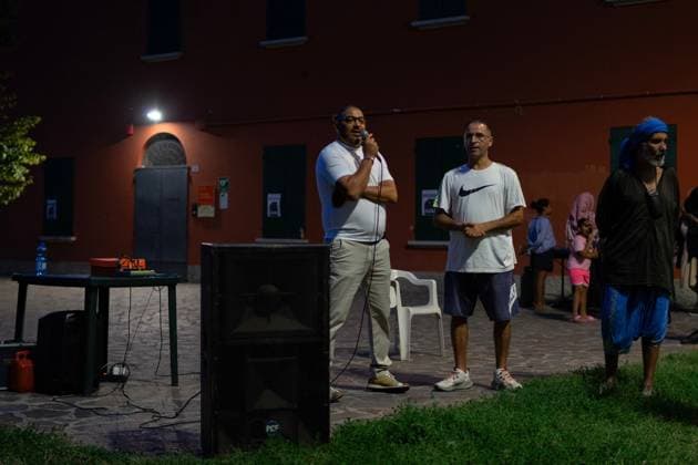 July 25, 2026, Bologna, IT: BOLOGNA, ITALY - JULY 25, 2026: Large crowds gather for a dinner and vigil in memory of Abderrahim Fakir at Pilastro Park, Bologna. The neighborhood event was organized by local grassroots committees together with Fakir s family, following days of citywide mobilization to commemorate the 42-year-old Moroccan man who died on July 19 during a police stop. JNA Press Bologna IT - ZUMAq101 20260725_zna_q101_346 Copyright: xThomasxCavagnax