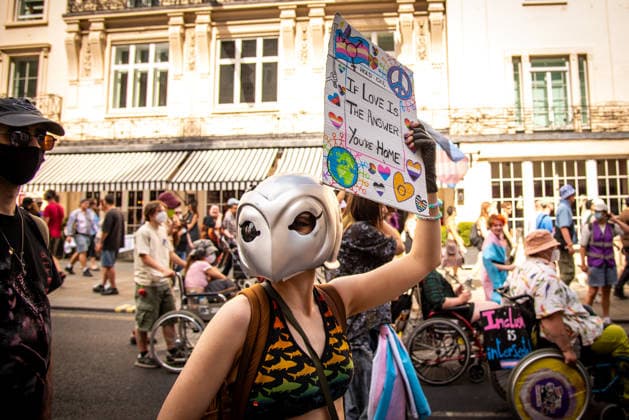 July 25, 2026, London, United Kingdom: A masked protestor holds a placard during the London Trans+ Pride 2026 Parade. New EHRC rules limiting single-sex spaces to biological sex created a bleak backdrop for this year s London Trans+ Pride march. London United Kingdom - ZUMAs197 20260725_aaa_s197_323 Copyright: xLoredanaxSangiulianox