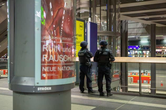 July 25, 2026, Berlin, Berlin: Police officers patrol inside Berlin Central Station after the car attack at CSD Berlin. The incident prompted an increased security presence at major public transport locations as authorities monitored the situation and reassured travelers. Berlin INT - ZUMAc291 20260725_zip_c291_001 Copyright: xMariaxCastrox