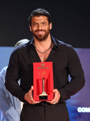 IPA86995348 - Soverato (CZ), Magna Graecia Film Festival - Opening Night. Pictured: Can Yaman receives the Colonna d Oro Award  Copyright: xMarcoxProvvisionatox xMarcoxProvvisionatox 86995348