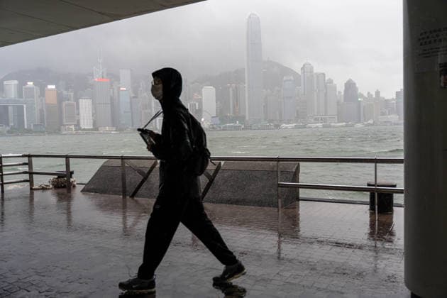 HONGKONG-TYPHOON NOUL A man in Tsim Sha Tusi during typhoon Noul in Hong Kong, July 26, 2026. NEXPHER Vernon Yuen HONG KONG