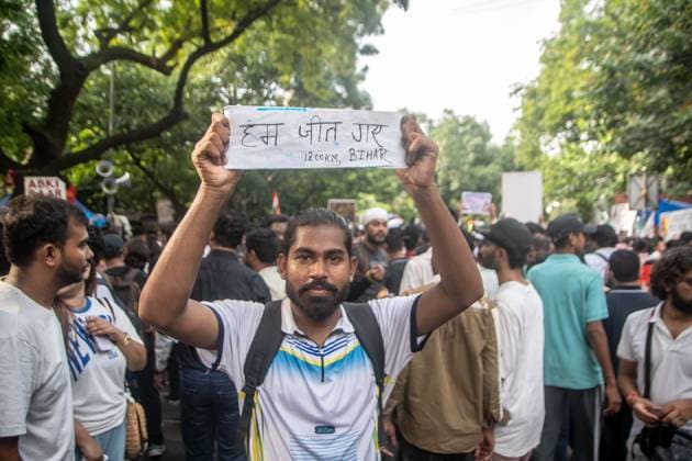 July 25, 2026, New Delhi, India: NEW DELHI, INDIA Ã¢â‚¬ JULY 25, 2026: Student protesters celebrate at Jantar Mantar following the resignation of India s Union Education Minister Dharmendra Pradhan, in New Delhi, India. Demonstrators hold placards reading Jeet ( Victory ), wave the Indian national flag and climb police barricades after the announcement, following days of nationwide protests over alleged irregularities in the country s education system. New Delhi India - ZUMAq101 20260725_zna_q101_367 Copyright: xAmitxShuklax
