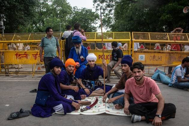 July 25, 2026, New Delhi, India: NEW DELHI, INDIA Ã¢â‚¬ JULY 25, 2026: Student protesters celebrate at Jantar Mantar following the resignation of India s Union Education Minister Dharmendra Pradhan, in New Delhi, India. Demonstrators hold placards reading Jeet ( Victory ), wave the Indian national flag and climb police barricades after the announcement, following days of nationwide protests over alleged irregularities in the country s education system. New Delhi India - ZUMAq101 20260725_zna_q101_369 Copyright: xAmitxShuklax