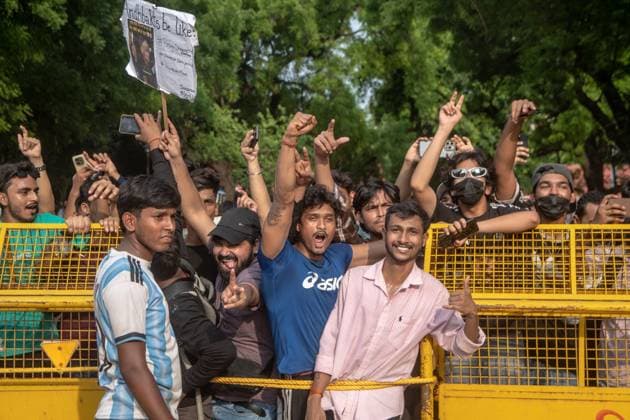 July 25, 2026, New Delhi, India: NEW DELHI, INDIA Ã¢â‚¬ JULY 25, 2026: Student protesters celebrate at Jantar Mantar following the resignation of India s Union Education Minister Dharmendra Pradhan, in New Delhi, India. Demonstrators hold placards reading Jeet ( Victory ), wave the Indian national flag and climb police barricades after the announcement, following days of nationwide protests over alleged irregularities in the country s education system. New Delhi India - ZUMAq101 20260725_zna_q101_371 Copyright: xAmitxShuklax