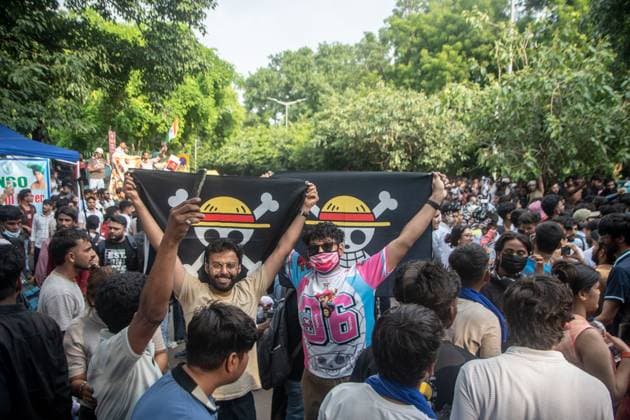 July 25, 2026, New Delhi, India: NEW DELHI, INDIA Ã¢â‚¬ JULY 25, 2026: Student protesters celebrate at Jantar Mantar following the resignation of India s Union Education Minister Dharmendra Pradhan, in New Delhi, India. Demonstrators hold placards reading Jeet ( Victory ), wave the Indian national flag and climb police barricades after the announcement, following days of nationwide protests over alleged irregularities in the country s education system. New Delhi India - ZUMAq101 20260725_zna_q101_385 Copyright: xAmitxShuklax