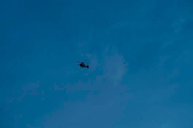 A firefighting helicopter flies over the area affected by the Sierra Oeste wildfire in the Madrid region dropping water on the fire front that forced the evacuation of thousands of people in the region. July 25, 2026. (202607251321)