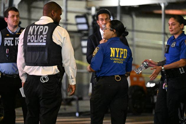 12-year-old boy killed, two men injured in Bronx shooting BRONX, NEW YORK, UNITED STATES - JULY 25: NYPD officers work the scene where a 12-year-old boy was killed and two men were injured in a shooting outside of a Supermarket and Deli at 104 Elliot Place in Bronx, New York, United States on July 25, 2026. Saturday afternoon at approximately 4:55 pm the shooting took place. A 12-year-old boy was shot to the shoulder and taken to Lincoln Hospital where he was pronounced dead. A 25-year-old man was shot to the buttocks and a 34-year-old man was shot to the foot. Both men are listed in stable condition at the hospital. There are no arrests, the identity of the deceased is pending proper family notification and the investigation is ongoing by  Copyright: x2026xAnadoluxKylexMazzax