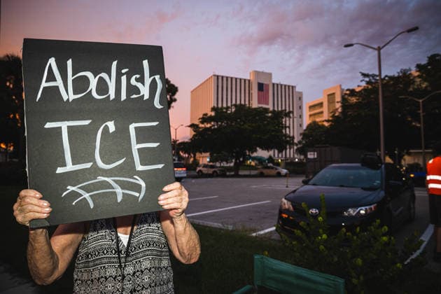 July 25, 2026, Naples, Florida, USA: Protestors hold signs in protest of the IMMIGRATION AND CUSTOMS ENFORCEMENT (ICE) tactics and treatment of community members. Naples USA - ZUMAd256 20260725_znp_d256_037 Copyright: xDavexDeckerx