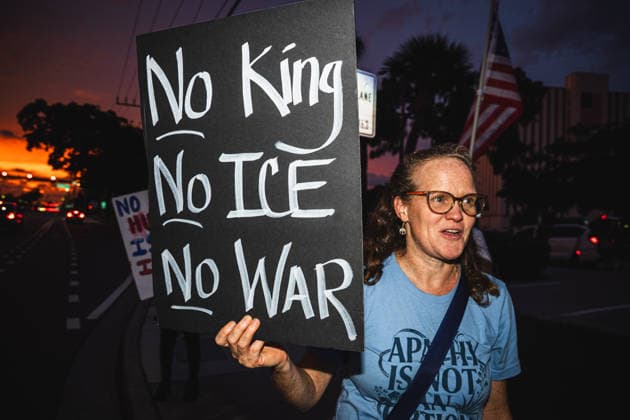 July 25, 2026, Naples, Florida, USA: Protestors hold signs in protest of the IMMIGRATION AND CUSTOMS ENFORCEMENT (ICE) tactics and treatment of community members. Naples USA - ZUMAd256 20260725_znp_d256_044 Copyright: xDavexDeckerx