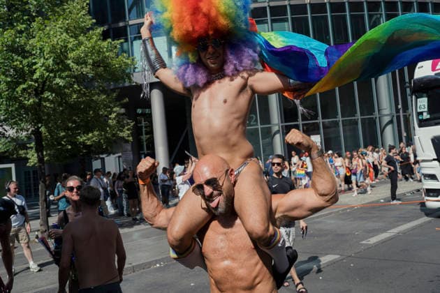 Christopher Street Day Pride Parade Berlin A participant rides on the shoulders of another participant during the Christopher Street Day (CSD) Pride parade in Berlin, Germany, on July 25, 2026. The annual event celebrates LGBTQIA+ pride while advocating for equality, diversity, and human rights under the 2026 slogan Taking a stand is Hot. Berlin State of Berlin Germany Copyright: xBabakxBordbarx